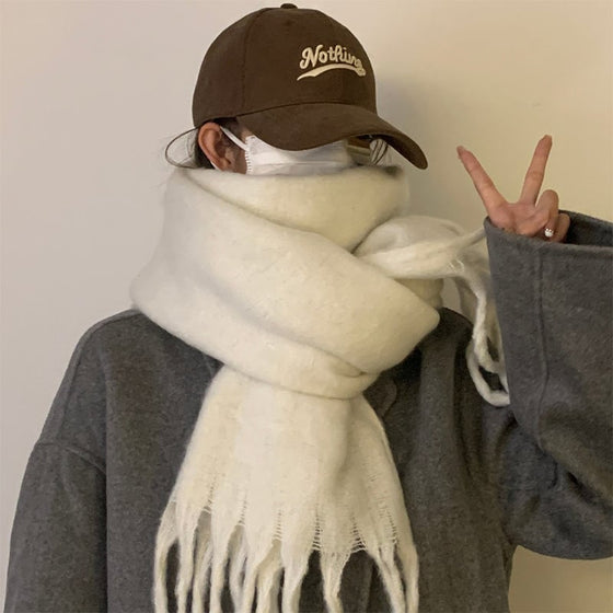 Damens enfärgade grova halsduk med tofsar