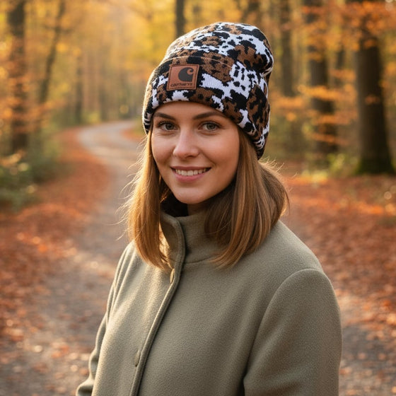 Stickad utomhusmössa med ko-jacquard