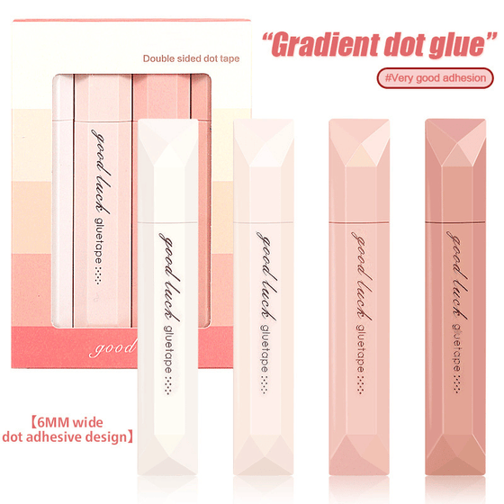 Dubbelhäftande tejprulle för scrapbooking