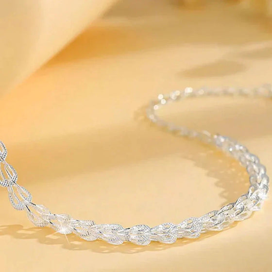 Phoenix svansfjäderarmband