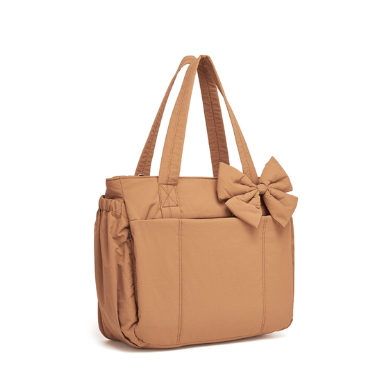 Vadderad väska med stor kapacitet och rosett