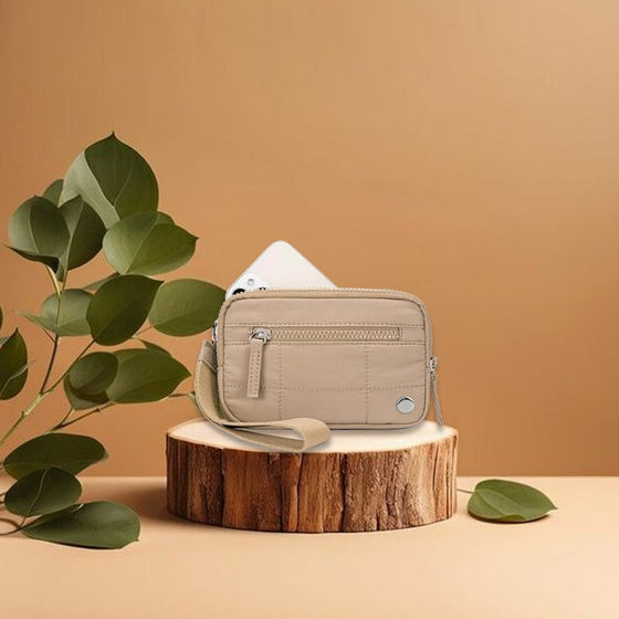 Quiltad handledsväska med armband