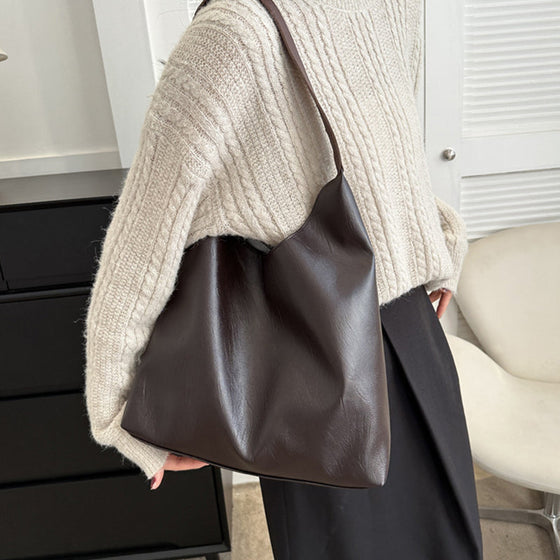 Enfärgad axelremsväska i västerländsk stil