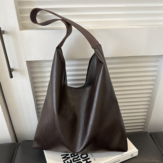 Enfärgad axelremsväska i västerländsk stil