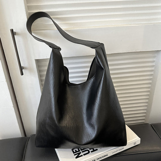 Enfärgad axelremsväska i västerländsk stil