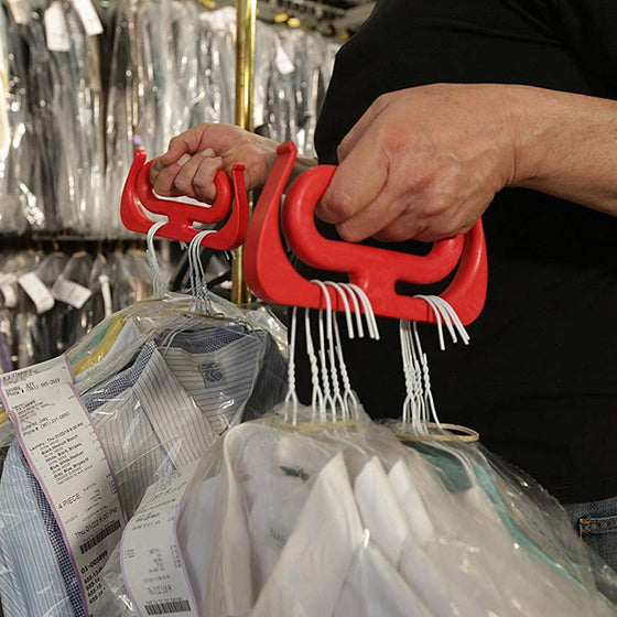 Multifunktionell handtagshållare för matkassar