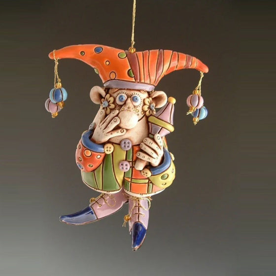 Färgglada ornament med narrklocka