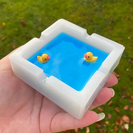 En askkopp formad som en badank