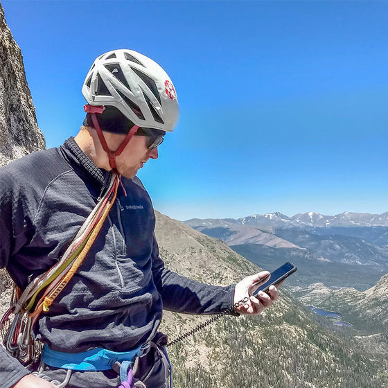 Fjäderrep för telefonens fallskydd och stöldskydd