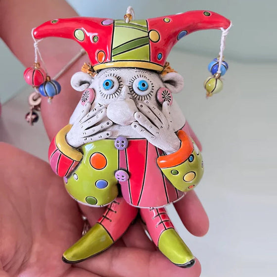 Färgglada ornament med narrklocka