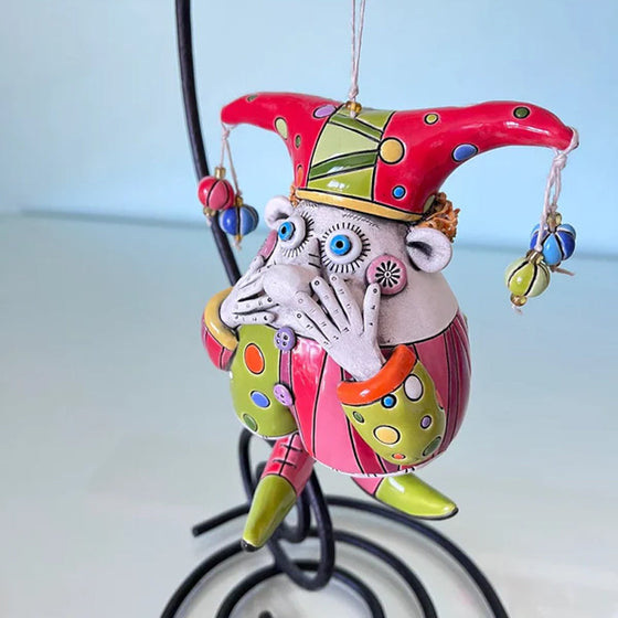 Färgglada ornament med narrklocka