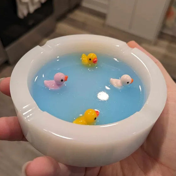 En askkopp formad som en badank