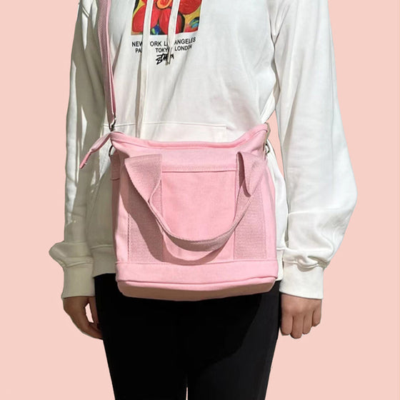 Handväska med flera fickor