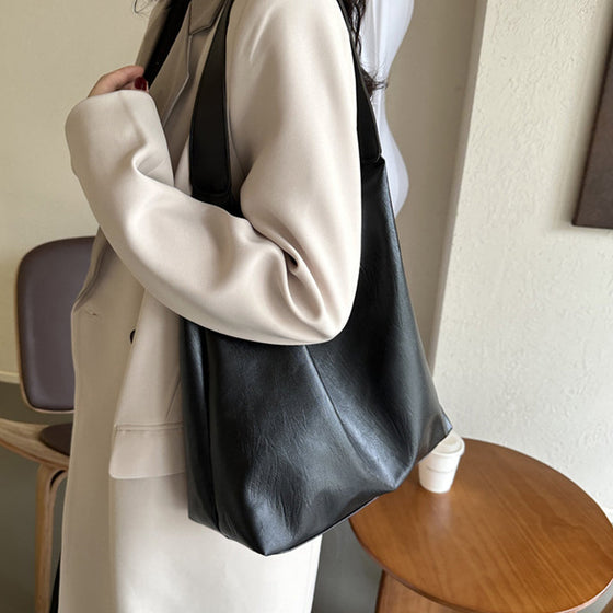 Enfärgad axelremsväska i västerländsk stil