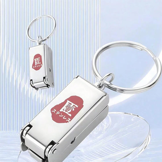 Bärbar mini hopfällbar nagelklippare