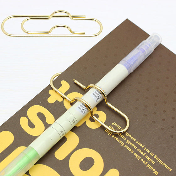 Multifunktionella metallfärgade pappersklämmor