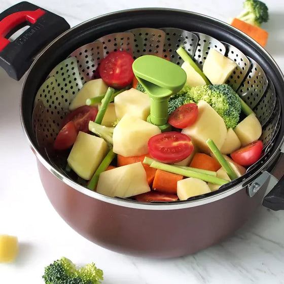 Blomformad fällbar ångkokare av stål