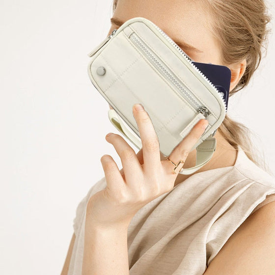 Quiltad handledsväska med armband