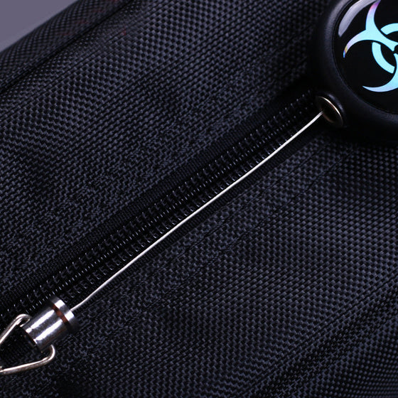 Nyckelbricka med infällbar stållina