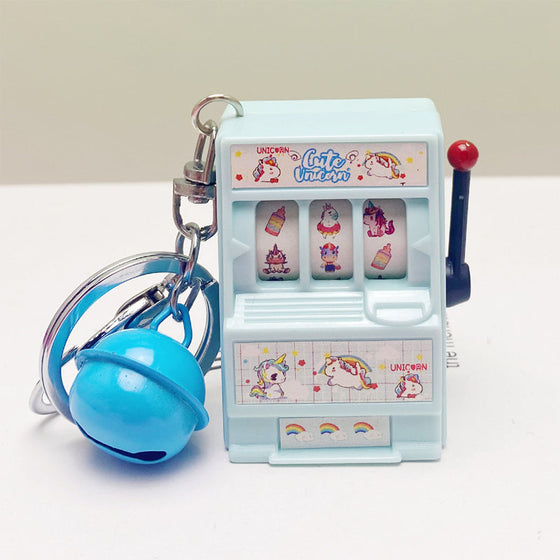 Nyckelring utformad i form av en spelautomat