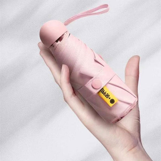 Fickparaply med sol- och regnskydd