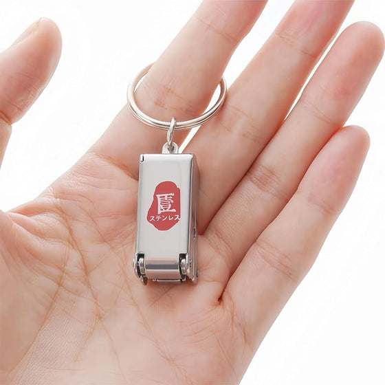 Bärbar mini hopfällbar nagelklippare