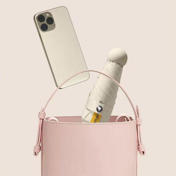 Fickparaply med sol- och regnskydd