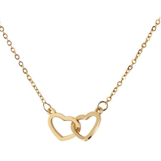 Halsband med två hjärtan i en roterande ros-presentbox