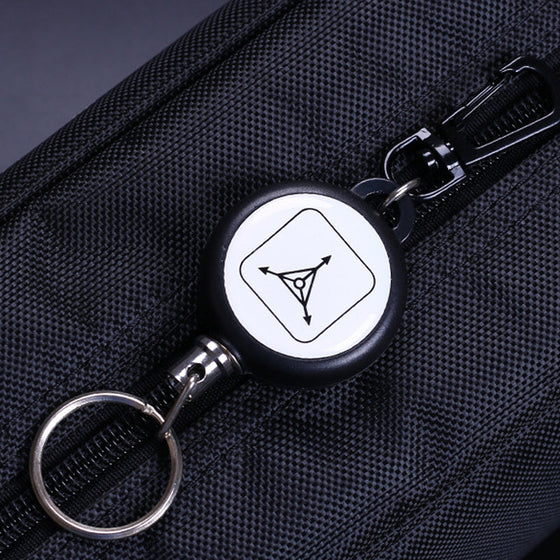 Nyckelbricka med infällbar stållina