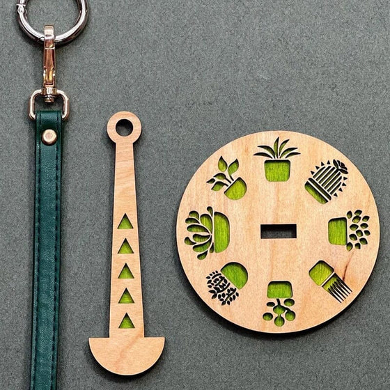 Trä handledsgarnhållare