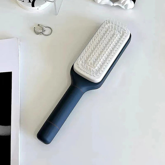 Roterande hårstryk-kam