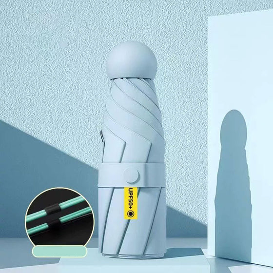 Fickparaply med sol- och regnskydd