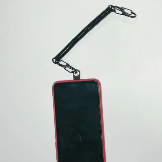 Fjäderrep för telefonens fallskydd och stöldskydd