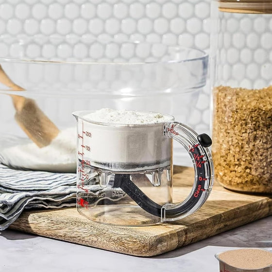 Multifunktionell integrerad justerbar måttkopp