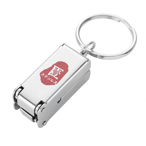 Bärbar mini hopfällbar nagelklippare