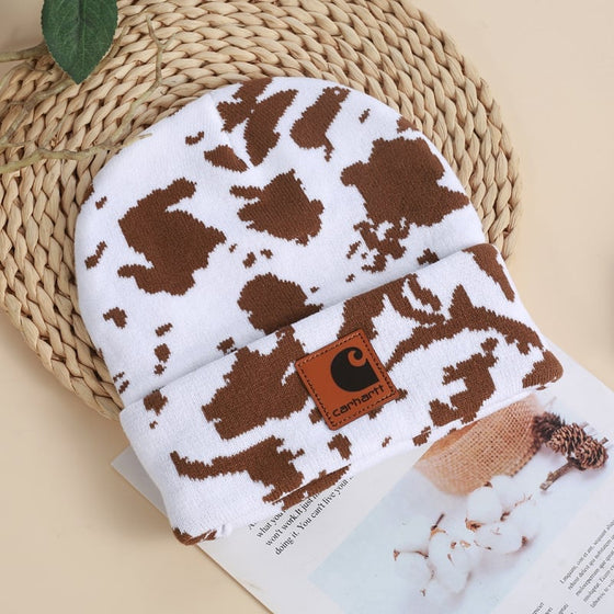 Stickad utomhusmössa med ko-jacquard