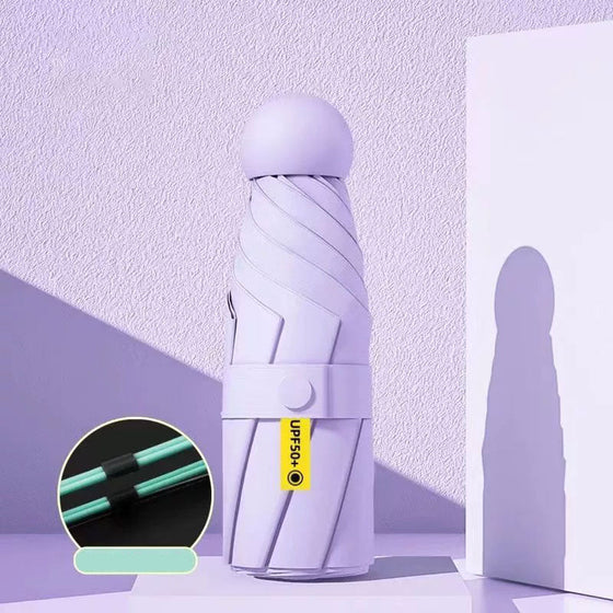 Fickparaply med sol- och regnskydd