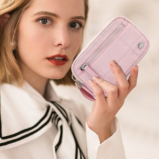 Quiltad handledsväska med armband