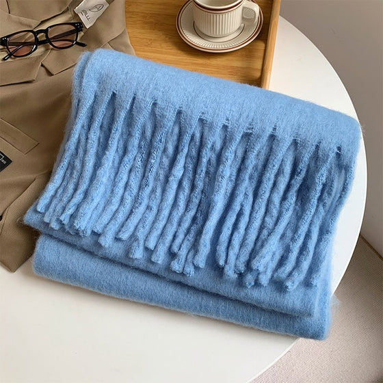 Damens enfärgade grova halsduk med tofsar