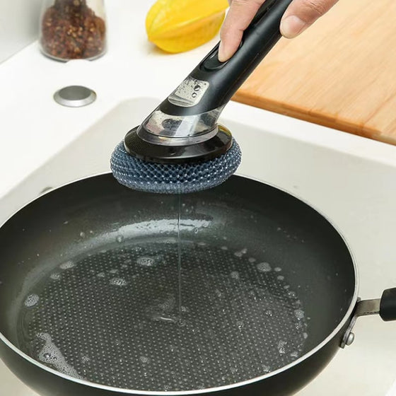 Långskaftad grytdiskborste med vätskepåfyllning