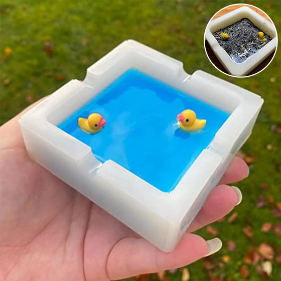 En askkopp formad som en badank