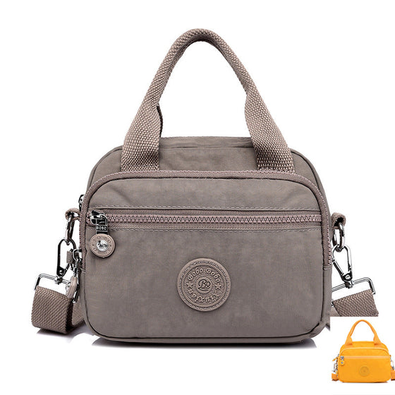 Handväska med flera fack