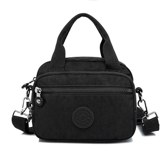 Handväska med flera fack