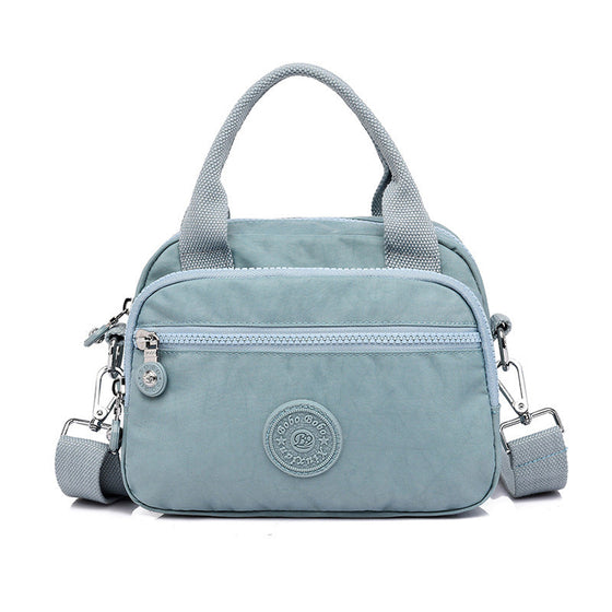 Handväska med flera fack