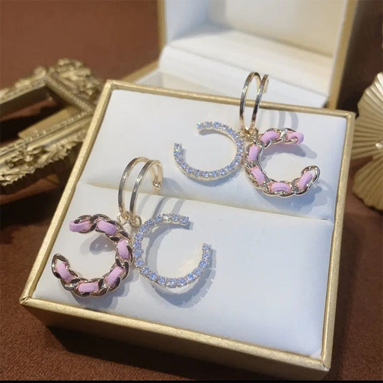 Dubbla "C" örhängen