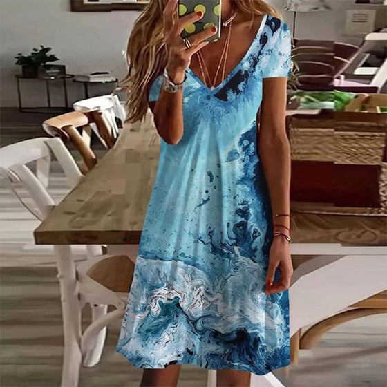 V-ringad miniklänning i blått tryck