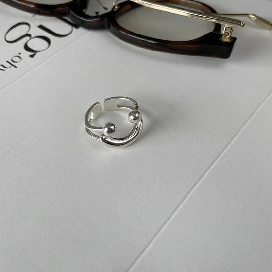 Leende formad öppningsring