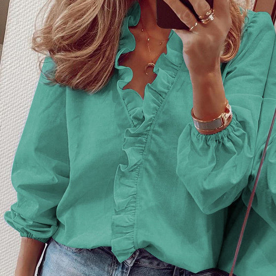 Elegant volang vit långärmad skjorta