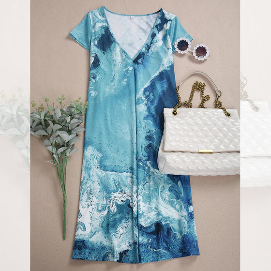 V-ringad miniklänning i blått tryck