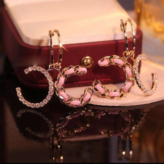 Dubbla "C" örhängen